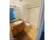 Well lit bathroom features a tub and shower combo, single sink vanity, and tile flooring at 45 Maleena Mesa St # 1321, Henderson, NV 89074