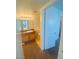 Bathroom with a single sink vanity and view into the next room at 45 Maleena Mesa St # 1321, Henderson, NV 89074
