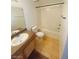 Bright bathroom with a tub and shower combo and single sink vanity at 45 Maleena Mesa St # 1321, Henderson, NV 89074