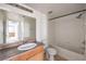 Bathroom featuring a vanity with sink, toilet, and tiled shower-over-tub at 45 Maleena Mesa St # 1321, Henderson, NV 89074