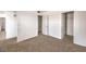 Carpeted bedroom with white walls and closet at 45 Maleena Mesa St # 1321, Henderson, NV 89074