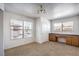 Bright bedroom with natural light, a built-in desk, and neutral walls, creating a versatile space at 45 Maleena Mesa St # 1321, Henderson, NV 89074