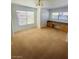 Bonus room with carpet and windows with built-in desk and drawer space at 45 Maleena Mesa St # 1321, Henderson, NV 89074