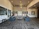 Lobby featuring a decorative chandelier, patterned floors and two leather couches at 45 Maleena Mesa St # 1321, Henderson, NV 89074