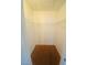 Empty walk-in closet with hanging racks and carpeted floor awaits personalization at 45 Maleena Mesa St # 1321, Henderson, NV 89074