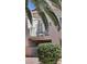 Condo building featuring balcony and mature landscaping at 5000 Red Rock St # 248, Las Vegas, NV 89118