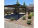 Picnic tables beneath a gazebo in the community park with desert landscaping at 5398 Robinera Ct, Las Vegas, NV 89166