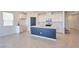Contemporary kitchen featuring sleek countertops, stainless steel appliances, and stylish island at 5398 Robinera Ct, Las Vegas, NV 89166