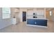 Spacious kitchen boasts modern appliances, a large island, and ample cabinet space, perfect for cooking at 5398 Robinera Ct, Las Vegas, NV 89166