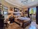 Bedroom with ceiling fan, bedside lamps and decorative artwork at 5416 Alabaster Ct, Las Vegas, NV 89149
