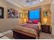 Bedroom with natural light, ceiling fan, and stylish decor at 5416 Alabaster Ct, Las Vegas, NV 89149