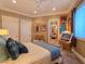 Warm bedroom with a serene ambiance and ample natural light showcases unique artwork and neutral tones at 5416 Alabaster Ct, Las Vegas, NV 89149