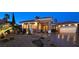 Charming single-story home boasting a tile roof, desert landscaping, and an attached garage at 5416 Alabaster Ct, Las Vegas, NV 89149