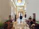 Grand foyer with soaring ceilings, elegant lighting, and marble floors exuding sophistication at 5416 Alabaster Ct, Las Vegas, NV 89149
