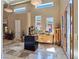 Grand foyer with a high ceiling, statues, travertine flooring, and custom lighting at 5416 Alabaster Ct, Las Vegas, NV 89149