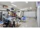 View of a three car garage featuring storage, shelving, and ample workspace at 5416 Alabaster Ct, Las Vegas, NV 89149