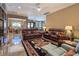 Spacious living room with ample seating and natural light, creating a comfortable gathering space at 5416 Alabaster Ct, Las Vegas, NV 89149