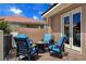 Outdoor patio with comfortable seating and view of the surrounding neighborhood at 5416 Alabaster Ct, Las Vegas, NV 89149