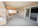 Spacious balcony with stucco accents, sliding glass door access, and neighborhood views at 5808 Amber Station Ave, Las Vegas, NV 89131