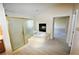 Bathroom with a jacuzzi tub, and a walk-in shower with tiled floor at 5808 Amber Station Ave, Las Vegas, NV 89131