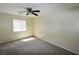 Bedroom featuring neutral walls, carpet, and a ceiling fan at 5808 Amber Station Ave, Las Vegas, NV 89131