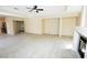 Spacious living room with fireplace and light wood-look flooring, ideal for entertaining and cozy evenings at 5808 Amber Station Ave, Las Vegas, NV 89131