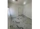 Bright bedroom with large window, marble flooring, and closet space at 6022 Highland Gardens Dr, North Las Vegas, NV 89031