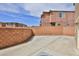 Private backyard featuring concrete patio, walled for seclusion, perfect for outdoor entertaining or relaxing at 6207 Hamilton Ave, Las Vegas, NV 89122