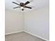 Neutral bedroom with a ceiling fan and gray carpeting at 6207 Hamilton Ave, Las Vegas, NV 89122