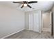 Standard bedroom with gray carpet, white walls, and a sliding door closet at 6207 Hamilton Ave, Las Vegas, NV 89122