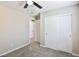 This bedroom features gray carpet and a double door closet with white trim at 6207 Hamilton Ave, Las Vegas, NV 89122