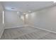 Open living room with neutral carpet and ample space for furniture and decor at 6207 Hamilton Ave, Las Vegas, NV 89122