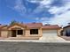 Inviting single-story home with a well-manicured front yard and attached two-car garage at 6600 Silver Penny Ave, Las Vegas, NV 89108