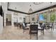 Inviting dining area featuring elegant tables, chairs, and stylish light fixtures at 676 Otter Brook St, Henderson, NV 89011