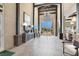 Grand lobby with soaring ceilings, stylish decor, and ample natural light at 676 Otter Brook St, Henderson, NV 89011