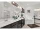 Elegant primary bathroom with double sinks, soaking tub, and separate shower at 676 Otter Brook St, Henderson, NV 89011