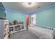 Light and airy bedroom with custom paint, overhead lighting and lots of charm at 689 Sea Star St, Henderson, NV 89002