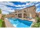 Spacious two-story home with an outdoor kitchen, pool, spa and balcony at 689 Sea Star St, Henderson, NV 89002