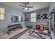 Well-equipped home gym with weights, equipment, and a wall-mounted mirror for effective workouts at 689 Sea Star St, Henderson, NV 89002