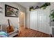 This bedroom features a closet with sliding doors, artwork, and natural light at 724 Smokey Mountain Ave, Henderson, NV 89012