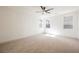 Spacious bedroom has a ceiling fan and multiple windows for lots of natural light at 7316 Childers Ave, Las Vegas, NV 89178
