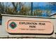 Close-up of Exploration Peak Park sign with Parks and Community Services emblem at 7316 Childers Ave, Las Vegas, NV 89178