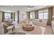 Comfortable living room offering ample seating and natural light from sliding glass doors to the outside at 7665 Serenity Bay Ln # Lot 58, North Las Vegas, NV 89084