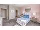 Cozy bedroom with soft pink walls, modern furnishings, and a serene ambiance at 7705 Serenity Bay Ln # Lot 57, North Las Vegas, NV 89084
