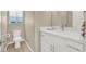 Neutral powder room features modern vanity, toilet, and fixtures at 8060 Haywood Estate Ave, Las Vegas, NV 89113
