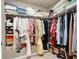 Walk-in closet with ample storage space and organized hanging clothes and shelves at 8060 Haywood Estate Ave, Las Vegas, NV 89113