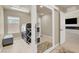 Laundry room with new washer and dryer and bright lighting at 8060 Haywood Estate Ave, Las Vegas, NV 89113