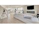 Bright open-concept living and kitchen space with modern fireplace and lots of natural light at 8060 Haywood Estate Ave, Las Vegas, NV 89113