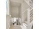 A view from the top of the staircase looking towards the floor below at 8060 Haywood Estate Ave, Las Vegas, NV 89113