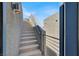 Concrete staircase leads up to a rooftop terrace with modern outdoor lighting at 8060 Haywood Estate Ave, Las Vegas, NV 89113